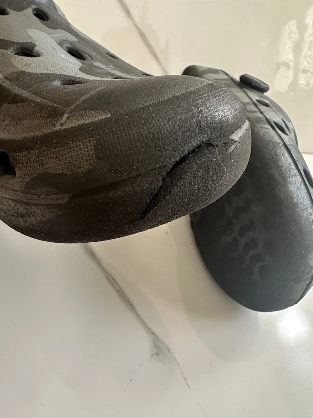 CROCS USED but still Good (has a hole but will be patched)
